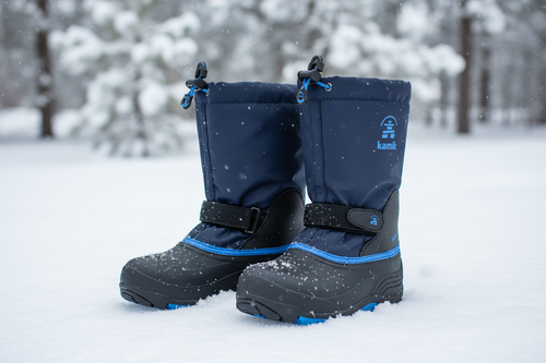 Kamik black and blue winter boots in snow